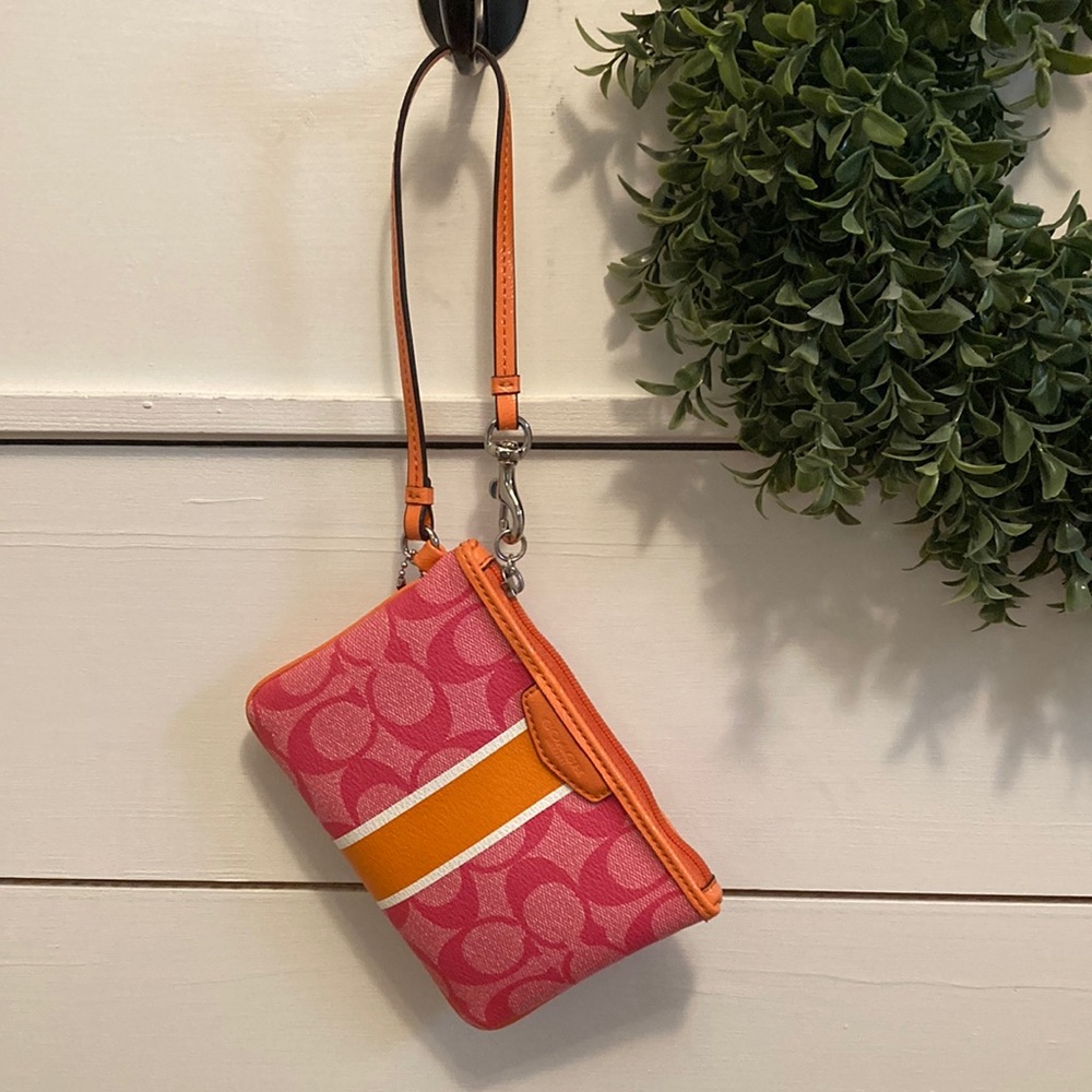 New Coach wristlet. Unused. Size 6” x 4”